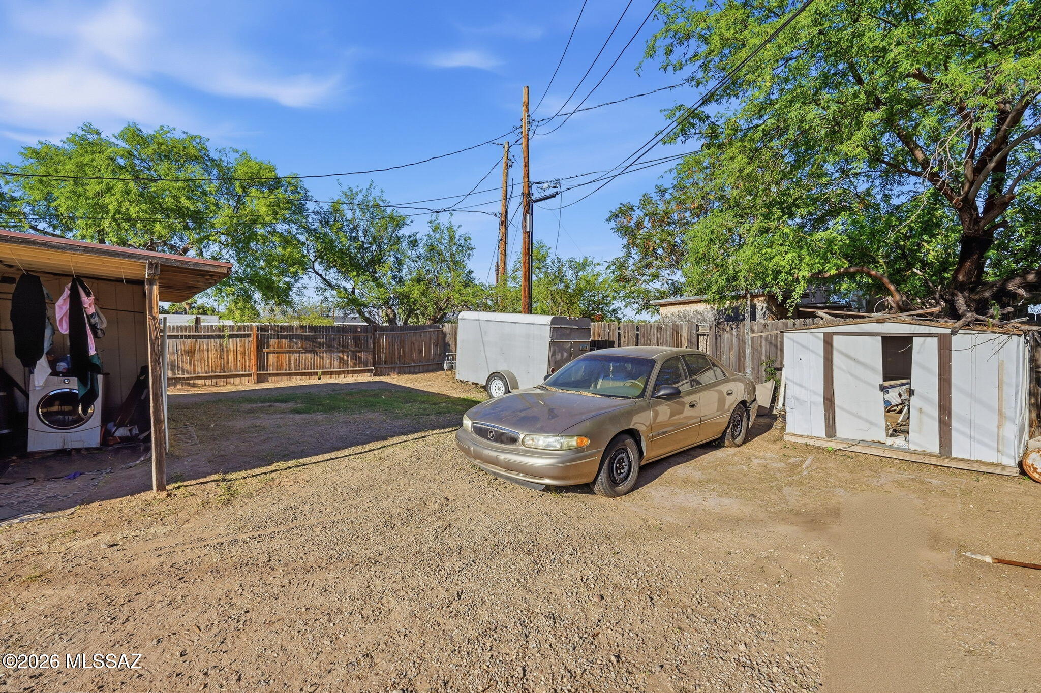 426 East Aragon Road, Unit 1 Tucson, AZ 85756 - Photo 18 of 18 a front view of a house with a yard