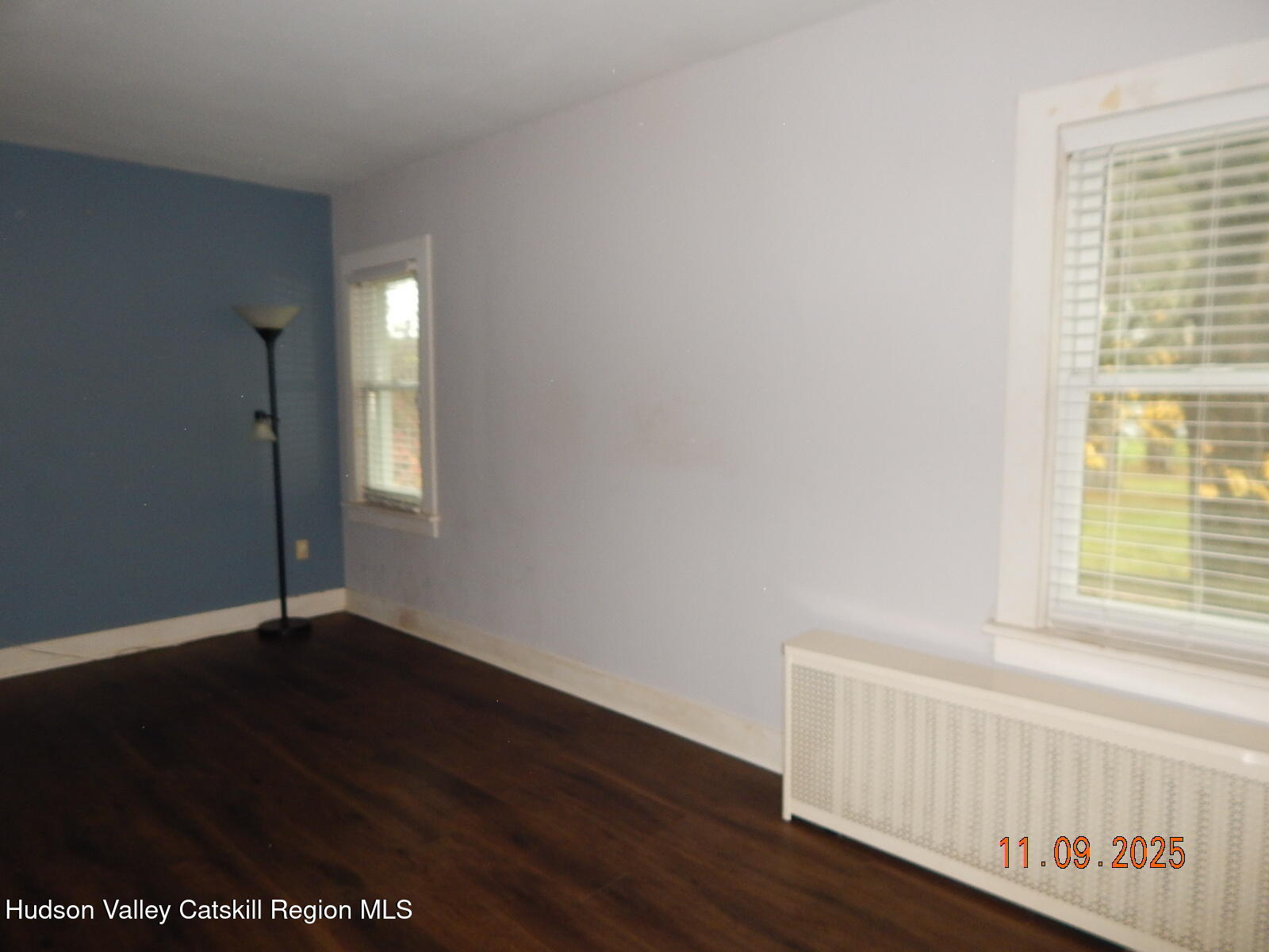 118 Ingalside Road Greenville, NY 12083 - Photo 19 of 37 an empty room with wooden floor and windows