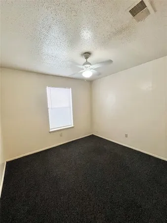 a bathroom with a double vanity sink toilet and shower