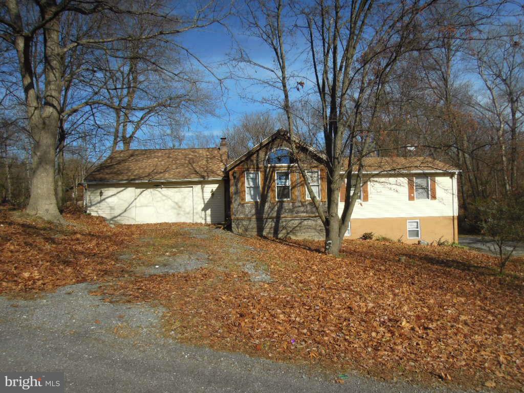 219 Almost Heaven Road Falling Waters, WV 25419 - Photo 1 of 17 Exterior (Front)
