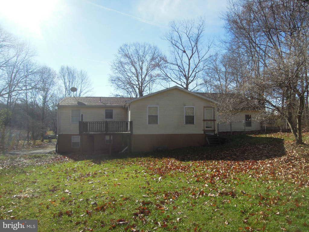 219 Almost Heaven Road Falling Waters, WV 25419 - Photo 4 of 17 Exterior (Rear)