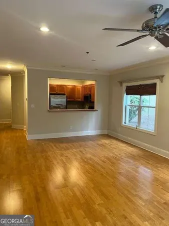 a view of an empty room and window