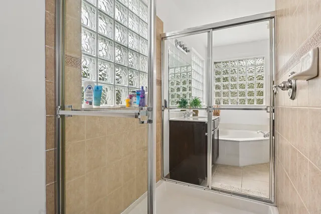 a view of a house with swimming pool and porch