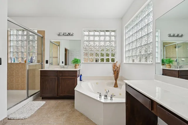 a view of a house with swimming pool and a yard