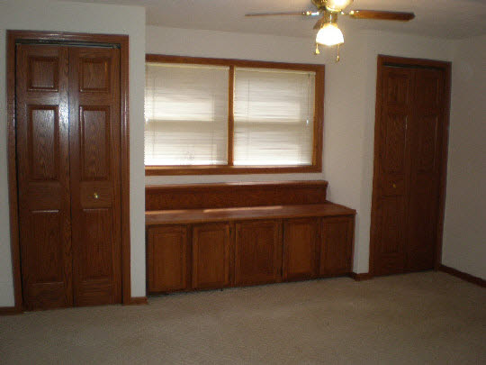 4177 North Meridian Road Rockford, IL 61101 - Photo 11 of 11 an empty room with windows and fan