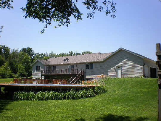 4177 North Meridian Road Rockford, IL 61101 - Photo 3 of 11 a front view of a house with a yard