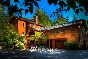 485 Whitecap Road Bellingham, WA 98229 - Photo 1 of 1 a front view of a house with a tree