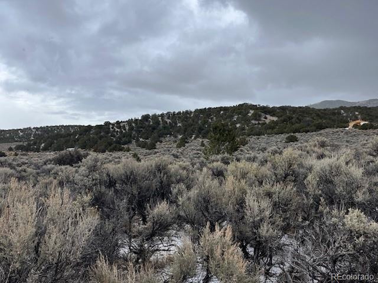 2242 Slegers Road Fort Garland, CO 81133 - Photo 32 of 35 a view of a city and mountains