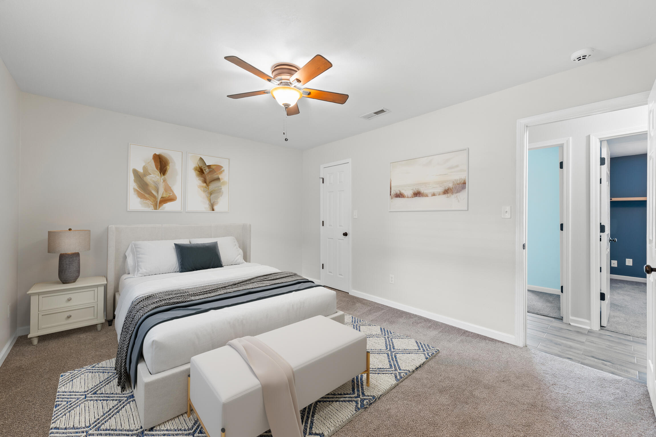 4217 North Island Road Pace, FL 32571 - Photo 3 of 25 a bedroom with a bed and a painting on the wall