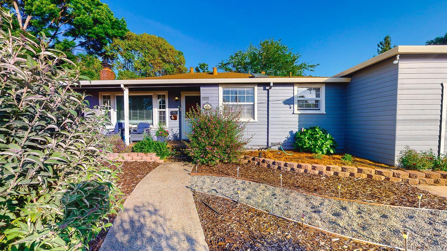 3000 Spring Creek Drive Santa Rosa, CA 95405 - Photo 1 of 1 a front view of a house with garden