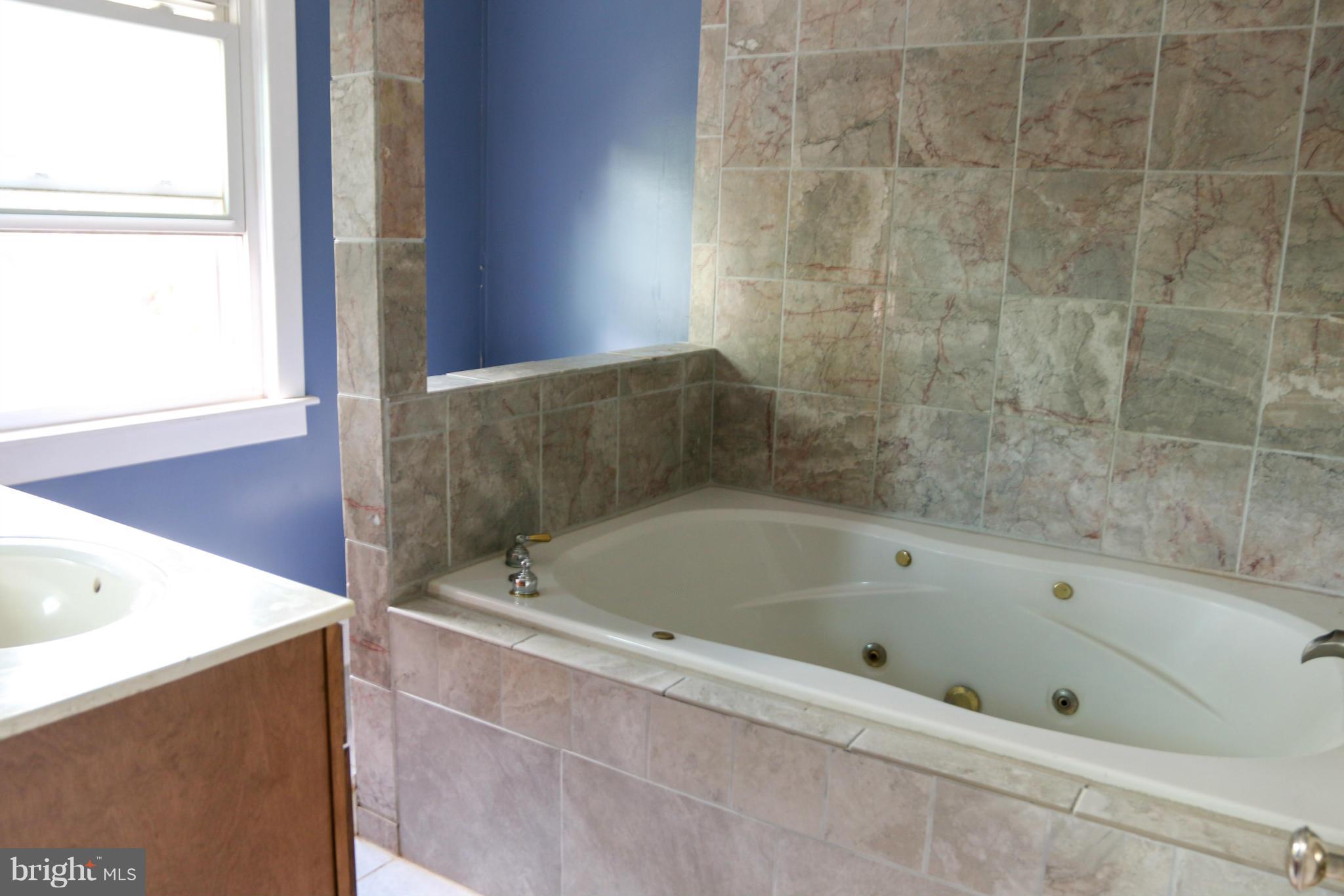 3309 Offutt Road Randallstown, MD 21133 - Photo 13 of 21 New Marble counters, floors and surround.