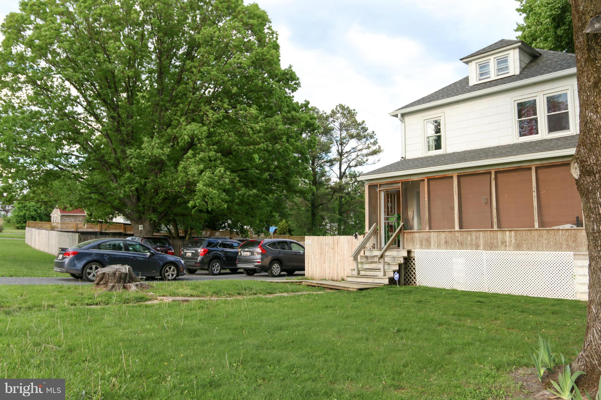 3309 Offutt Road Randallstown, MD 21133 - Photo 21 of 21 Front yard with view of parking and Wye Oak Tree