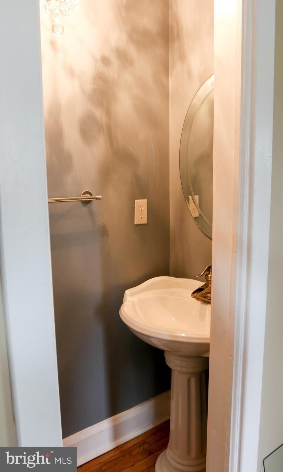3309 Offutt Road Randallstown, MD 21133 - Photo 7 of 21 Main level bath with Pedestal Sink