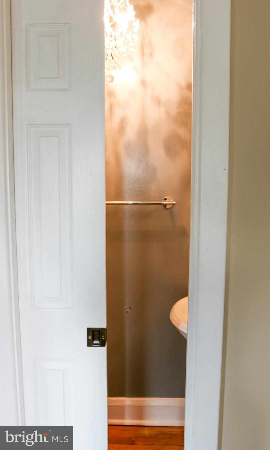 3309 Offutt Road Randallstown, MD 21133 - Photo 8 of 21 Bath on Main level with Pocket Door.