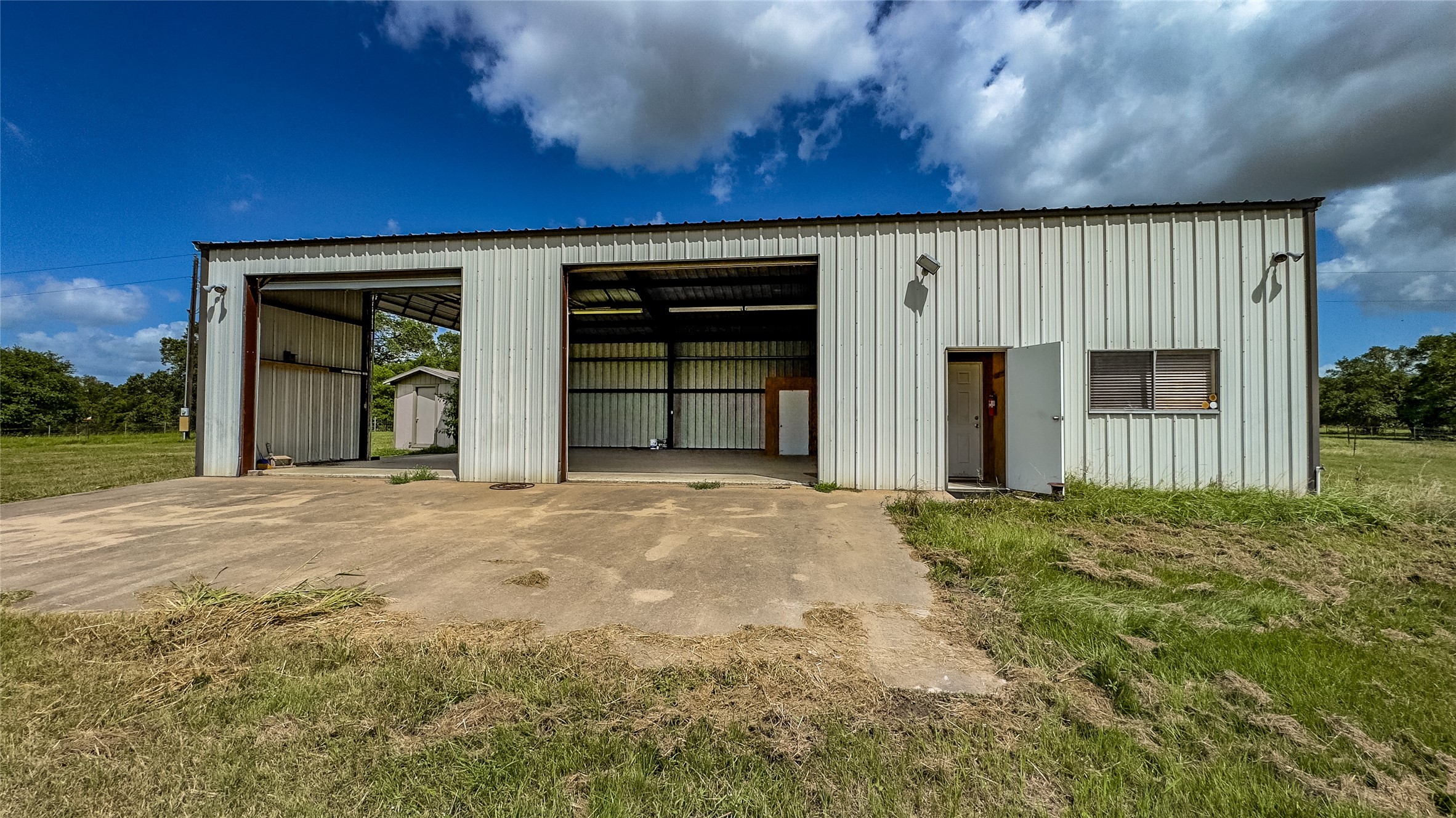 1470 South Nassau Road Round Top, TX 78954 - Photo 23 of 30 front view of a house with a yard