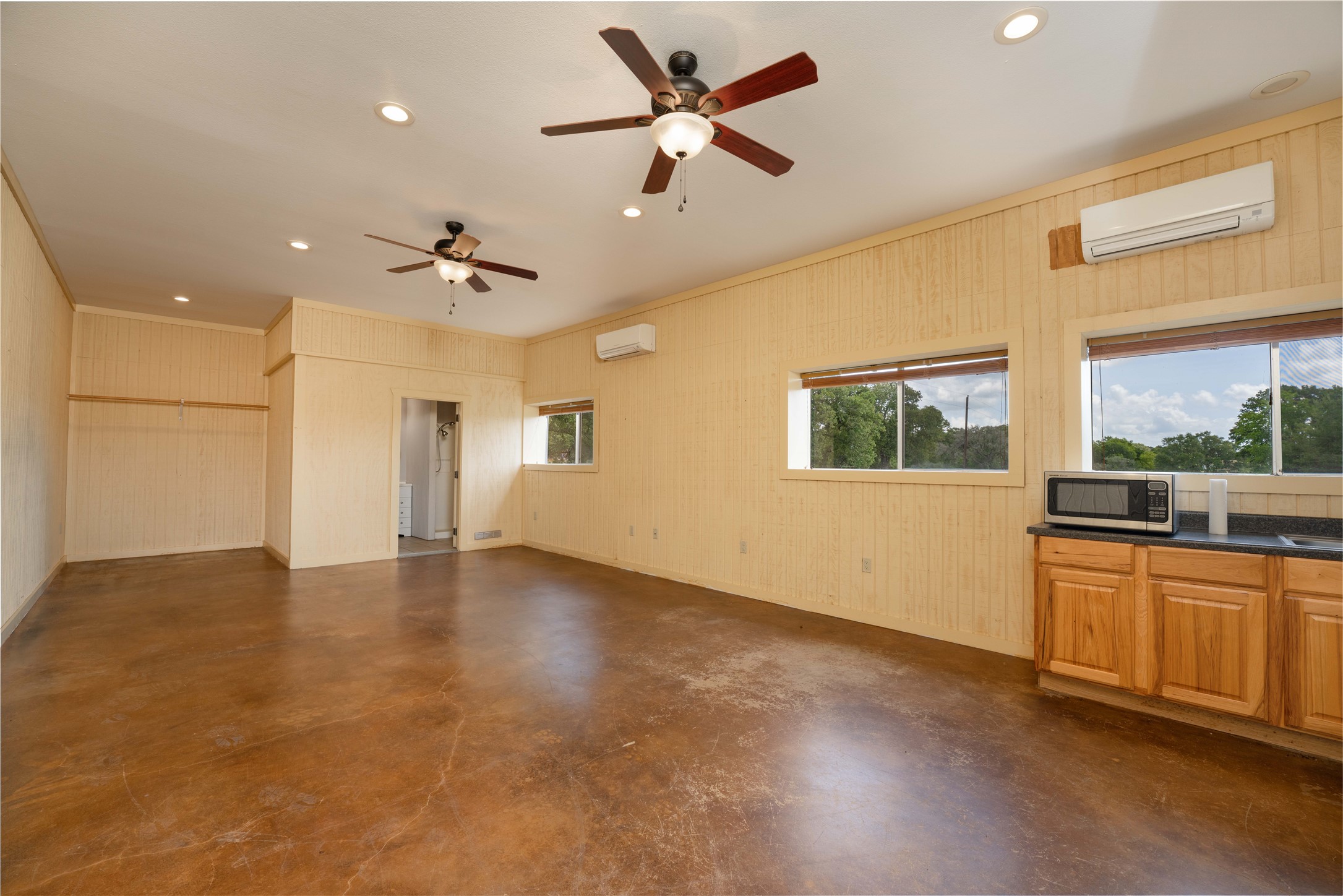 1470 South Nassau Road Round Top, TX 78954 - Photo 25 of 30 a view of a kitchen with a sink and a window