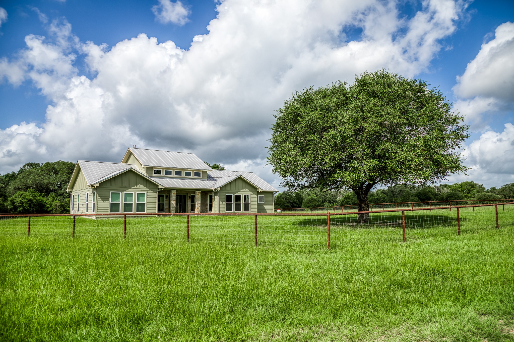 1470 South Nassau Road Round Top, TX 78954 - Photo 29 of 30 a front view of a house with a big yard