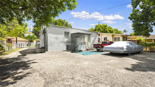 a car parked in front of a house