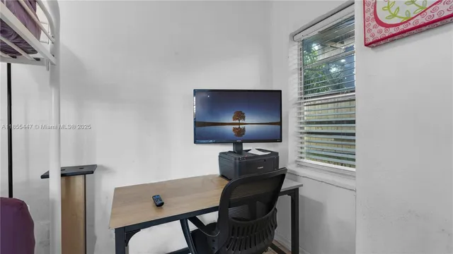 a workspace with furniture and lamp