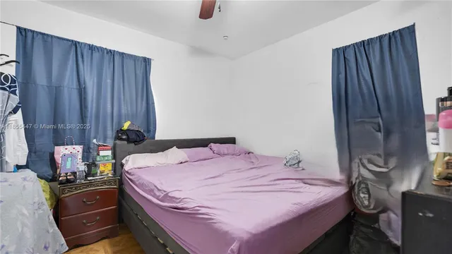 a bedroom with a bed and a closet