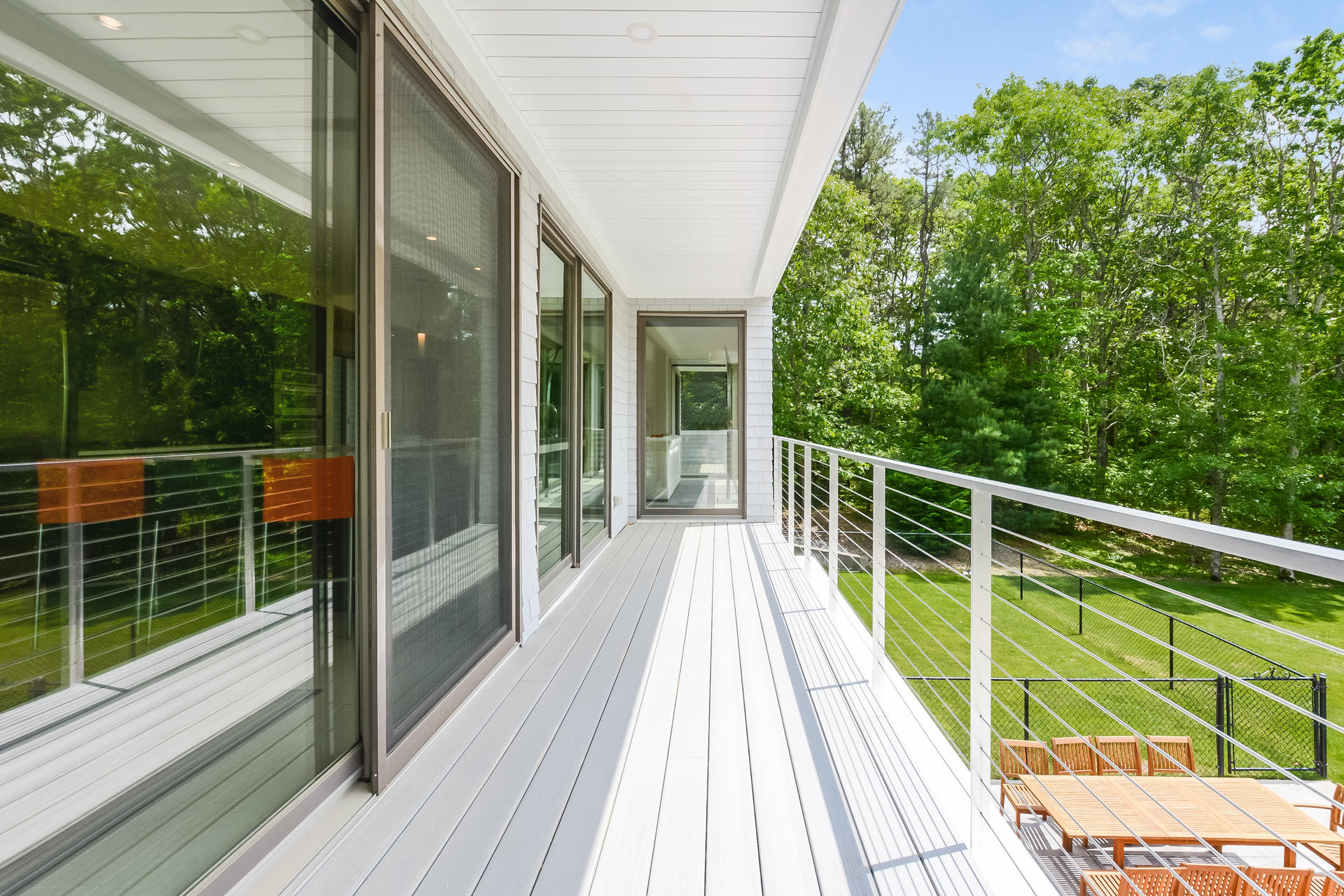 37 The Hunt Circle Mashpee, MA 02649 - Photo 18 of 73 a view of balcony with a large window and wooden floor