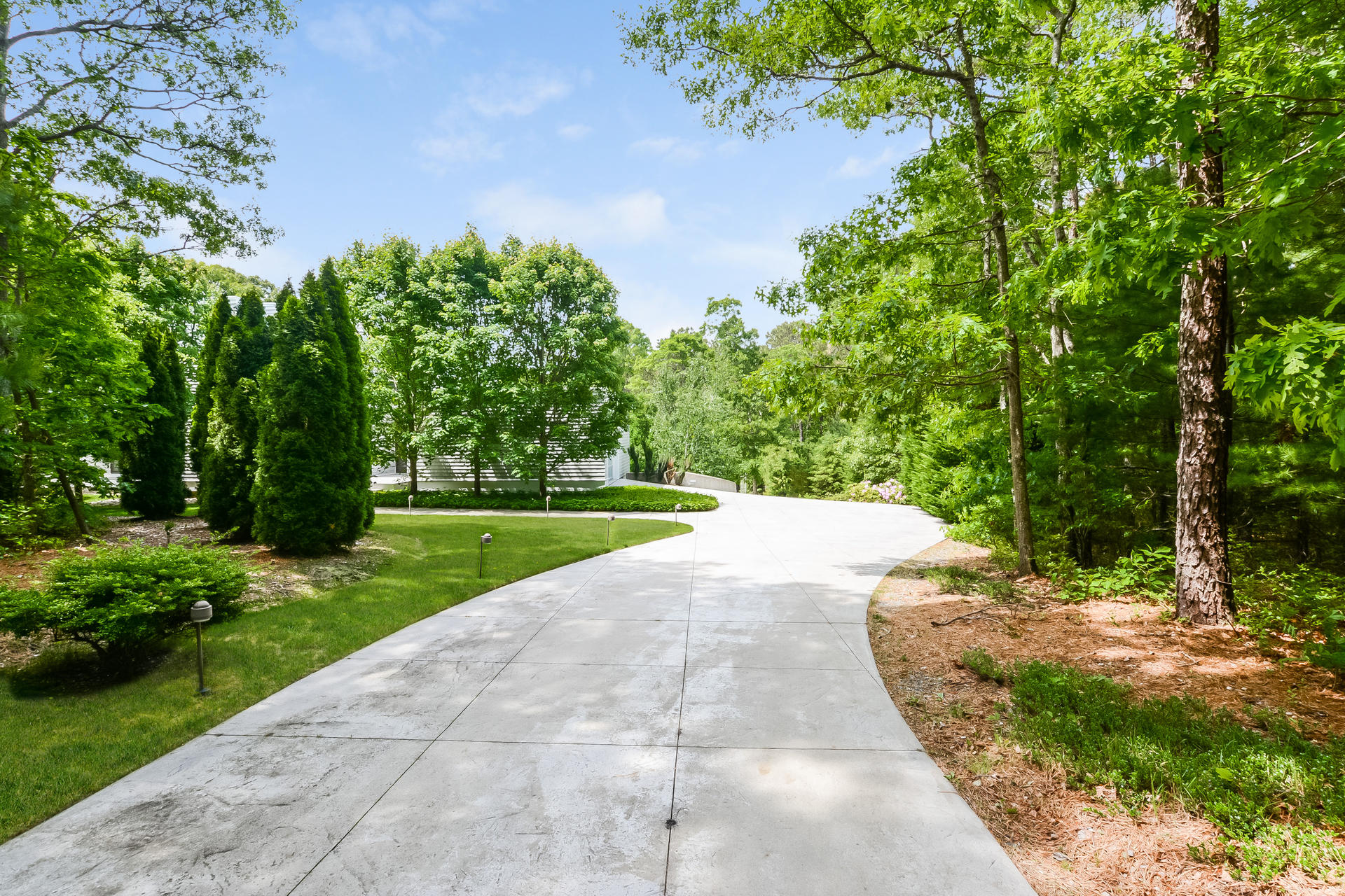 37 The Hunt Circle Mashpee, MA 02649 - Photo 3 of 73 a view of a garden with a fountain