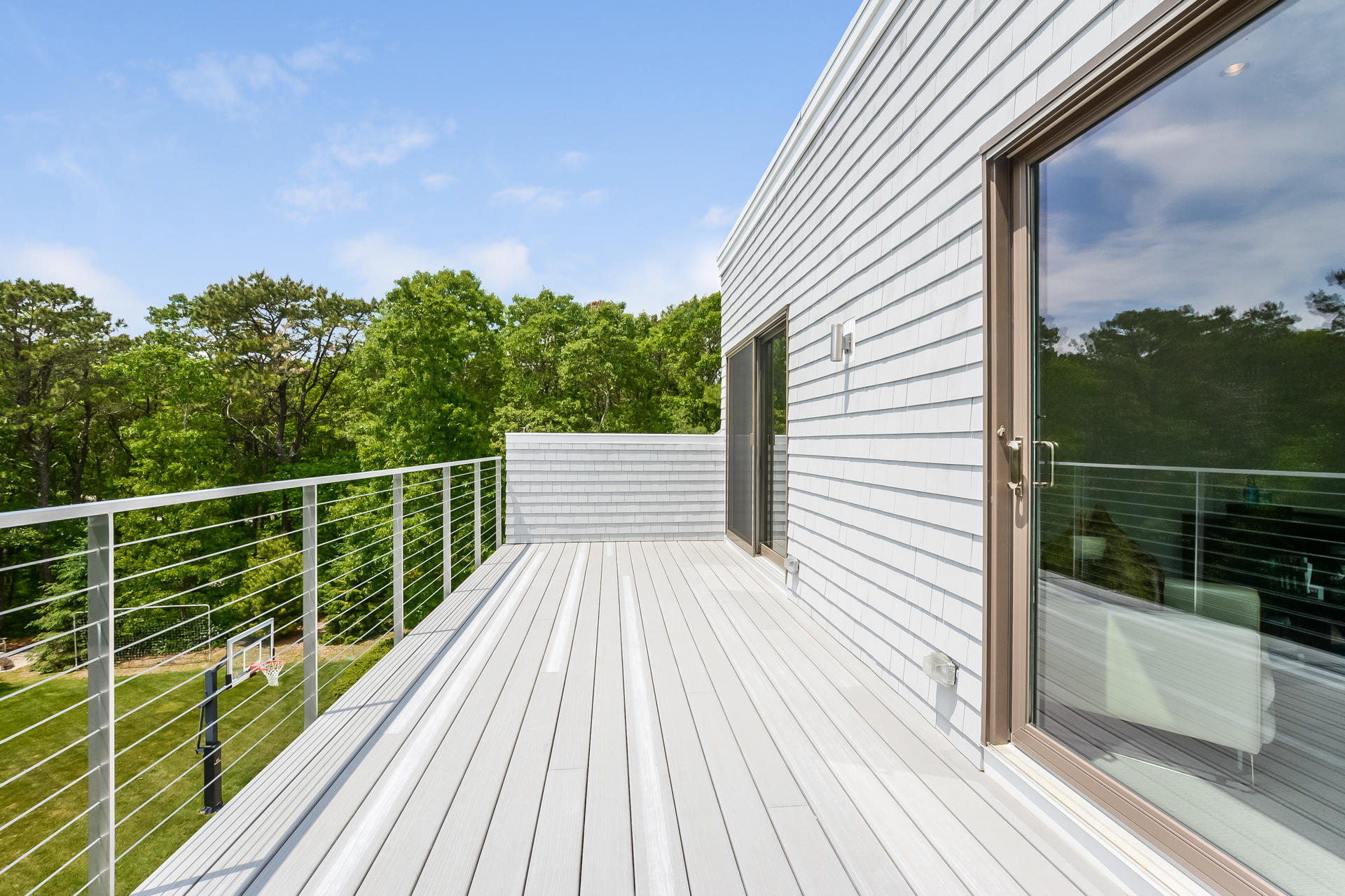 37 The Hunt Circle Mashpee, MA 02649 - Photo 33 of 73 a view of a balcony with wooden floor and fence
