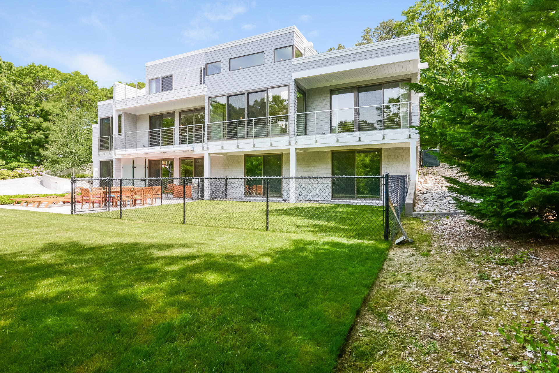 37 The Hunt Circle Mashpee, MA 02649 - Photo 53 of 73 a view of an apartment with a backyard
