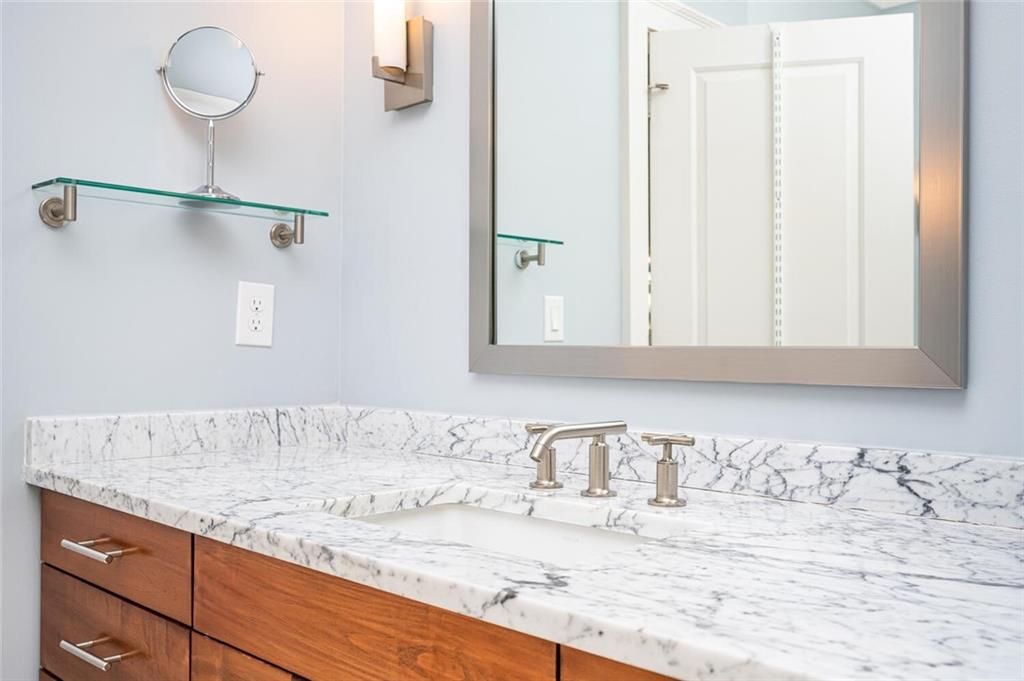 123 Ansley Street Decatur, GA 30030 - Photo 53 of 61 a bathroom with a granite countertop sink and a mirror