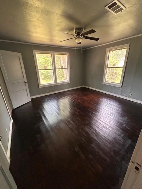 2524 Merwin Street Shreveport, LA 71103 - Photo 4 of 7 a view of an empty room with wooden floor and a window