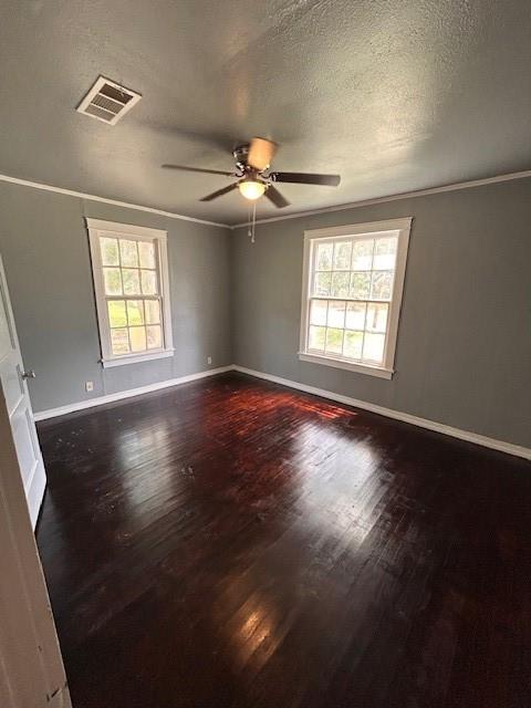 2524 Merwin Street Shreveport, LA 71103 - Photo 6 of 7 an empty room with wooden floor and windows