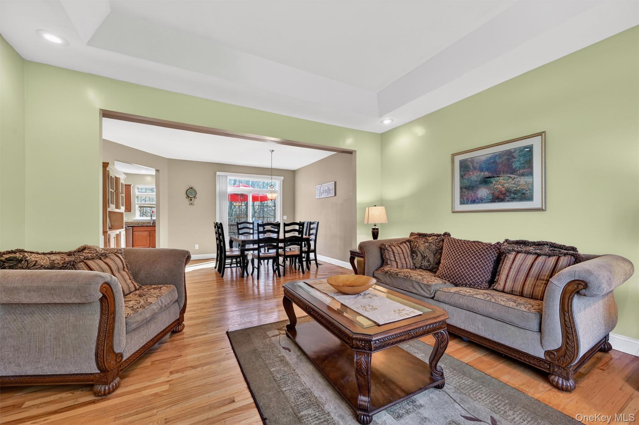 47 Willets Way Newburgh, NY 12550 - Photo 11 of 50 a living room with furniture a rug and a table