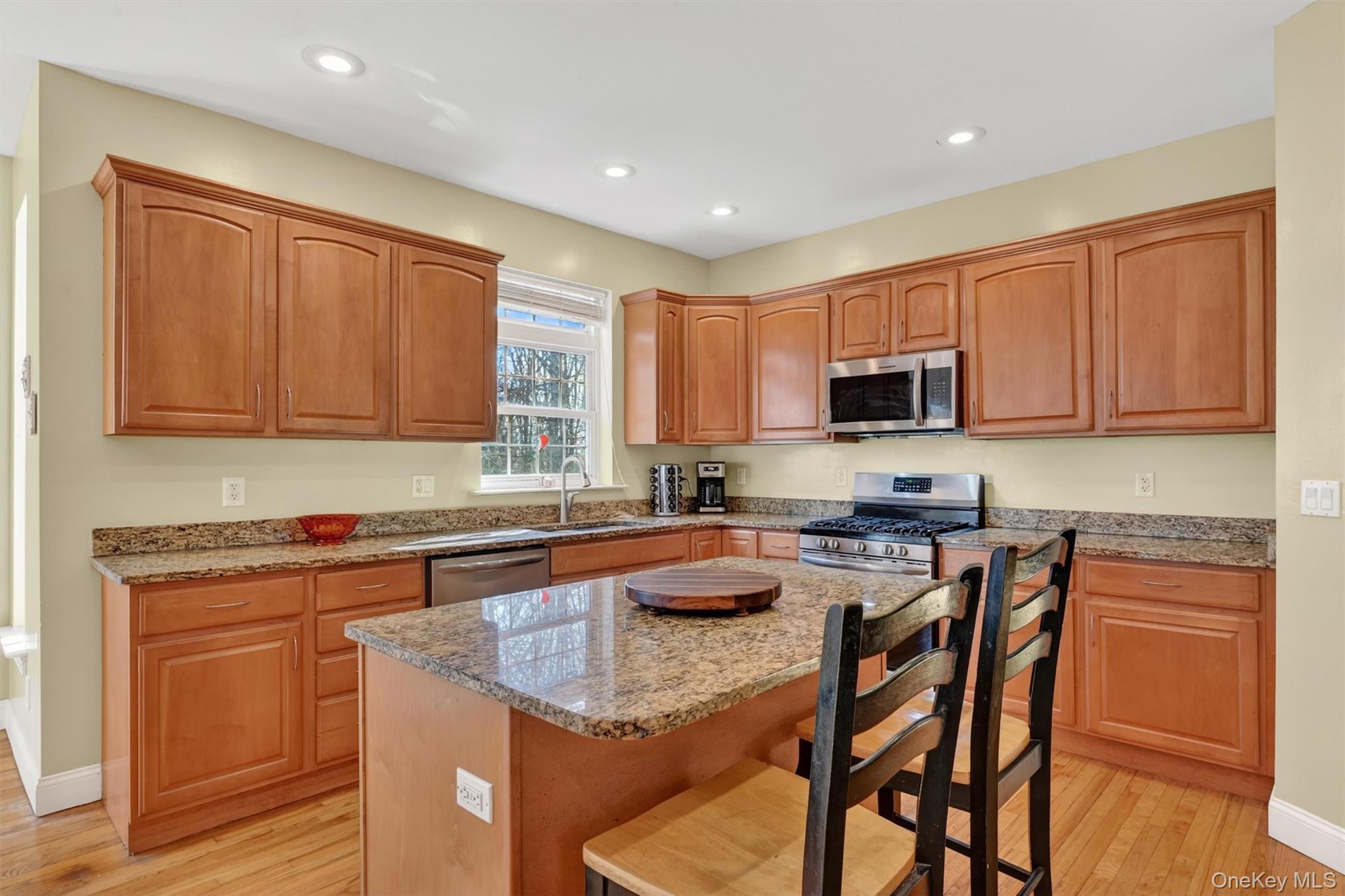 47 Willets Way Newburgh, NY 12550 - Photo 13 of 50 a kitchen with stainless steel appliances granite countertop wooden cabinets a stove top oven a sink and dishwasher