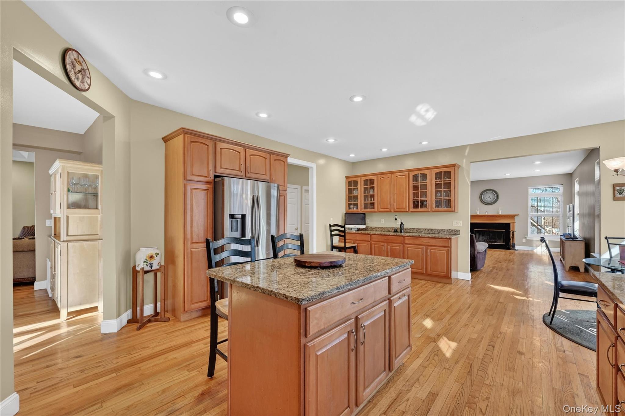 47 Willets Way Newburgh, NY 12550 - Photo 15 of 50 a kitchen with stainless steel appliances granite countertop a stove a sink dishwasher and a refrigerator with wooden floor