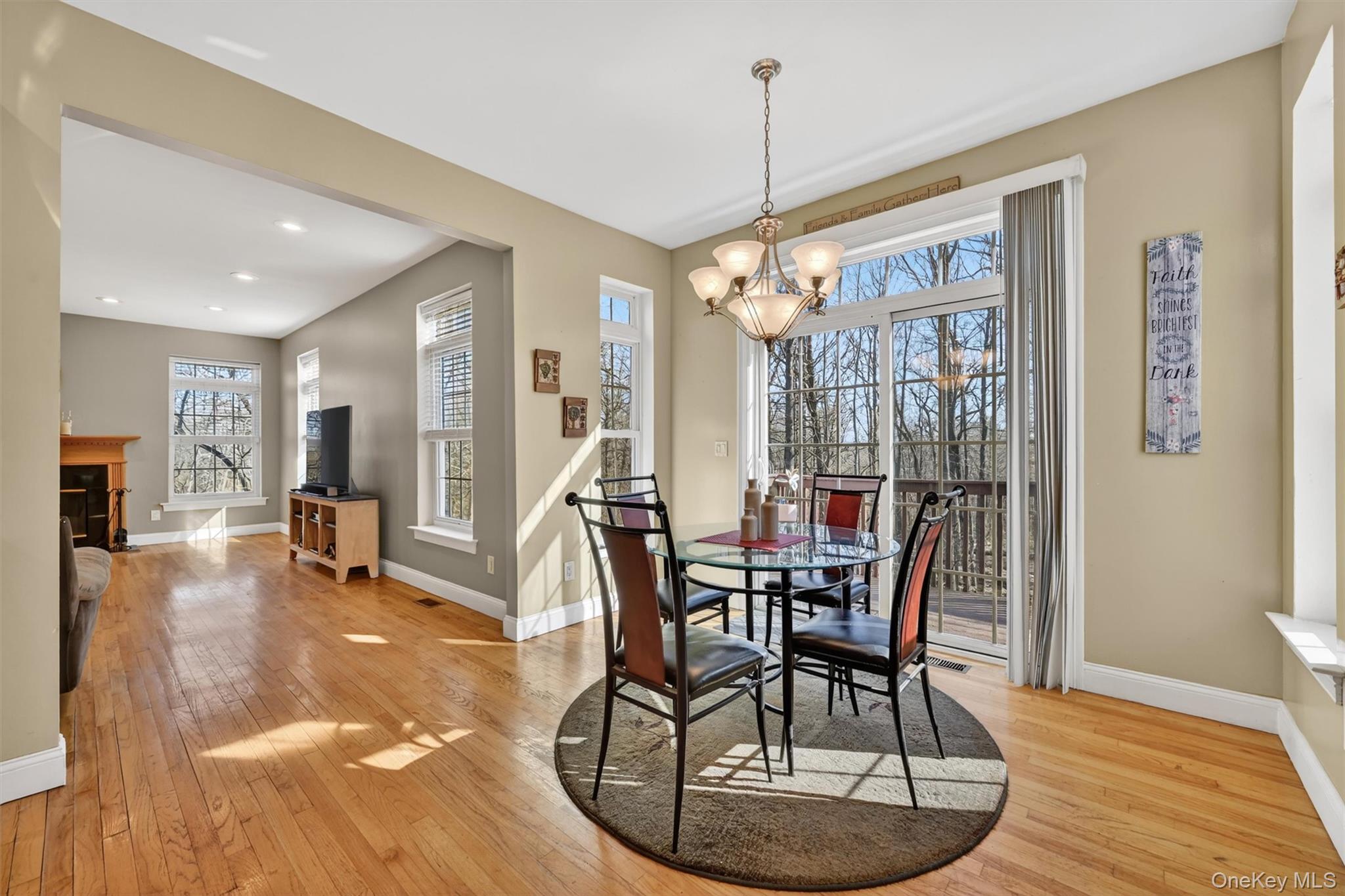 47 Willets Way Newburgh, NY 12550 - Photo 16 of 50 a view of a dining room with furniture window and wooden floor
