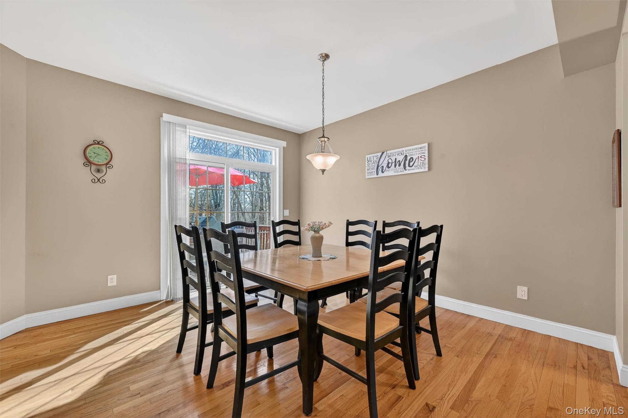 47 Willets Way Newburgh, NY 12550 - Photo 18 of 50 a view of a dining room with furniture and wooden floor