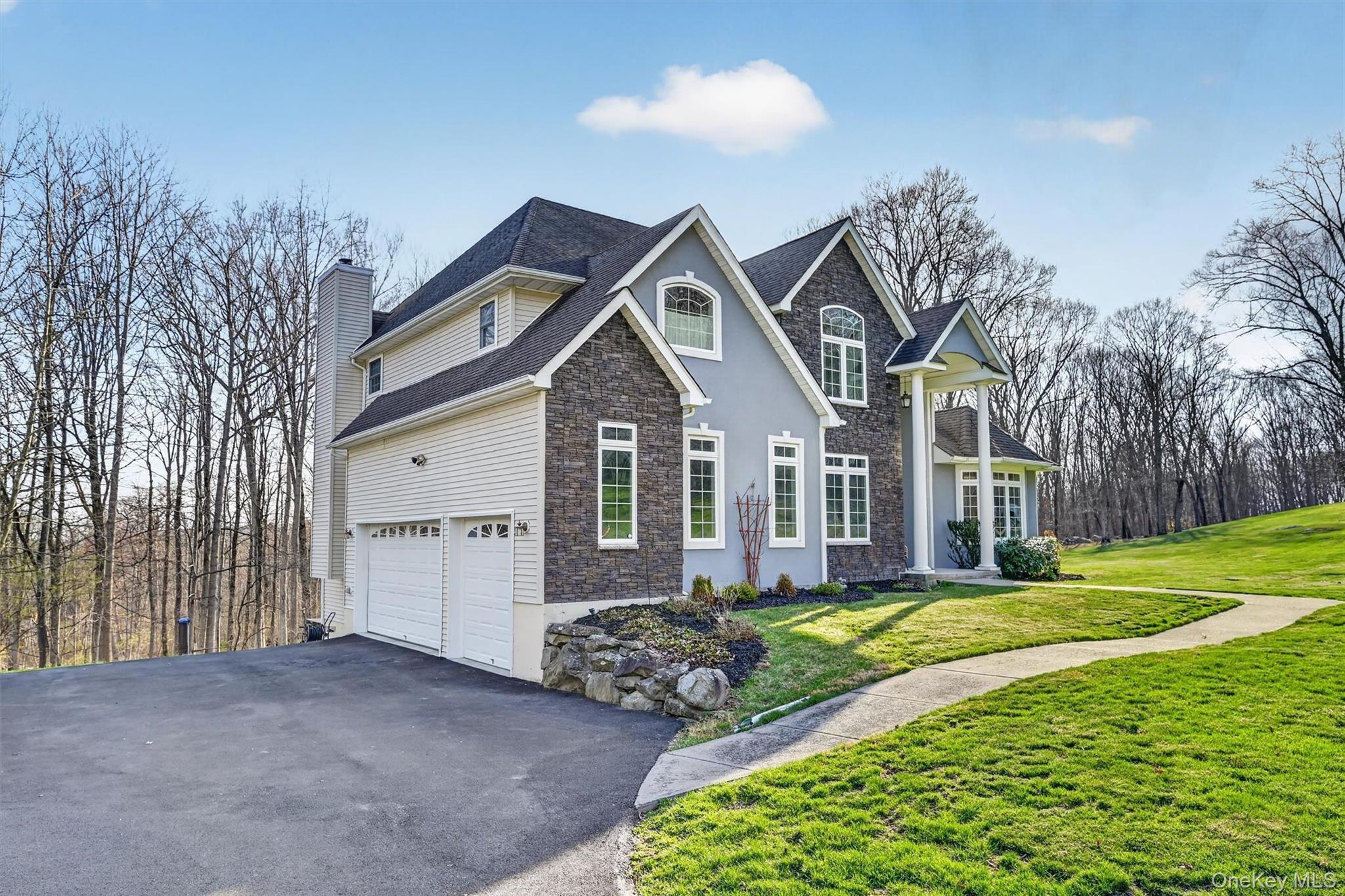 47 Willets Way Newburgh, NY 12550 - Photo 2 of 50 a front view of a house with a yard