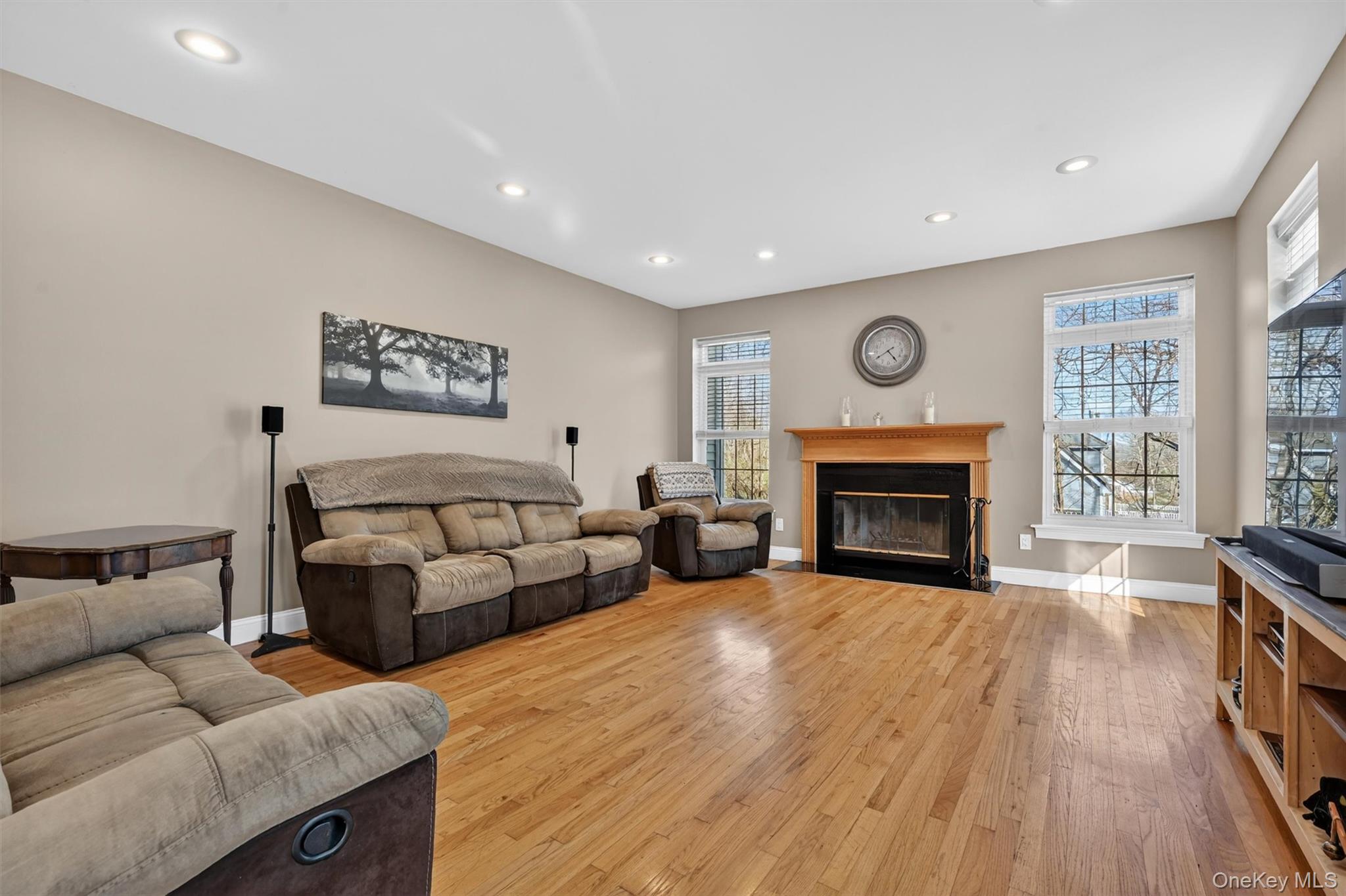 47 Willets Way Newburgh, NY 12550 - Photo 21 of 50 a living room with furniture and a fireplace