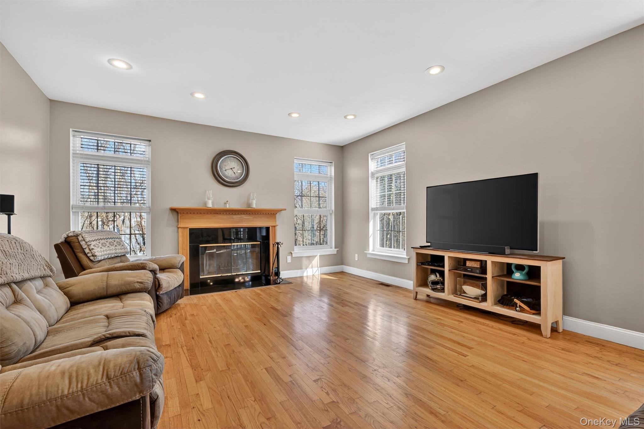 47 Willets Way Newburgh, NY 12550 - Photo 23 of 50 a living room with furniture and a flat screen tv