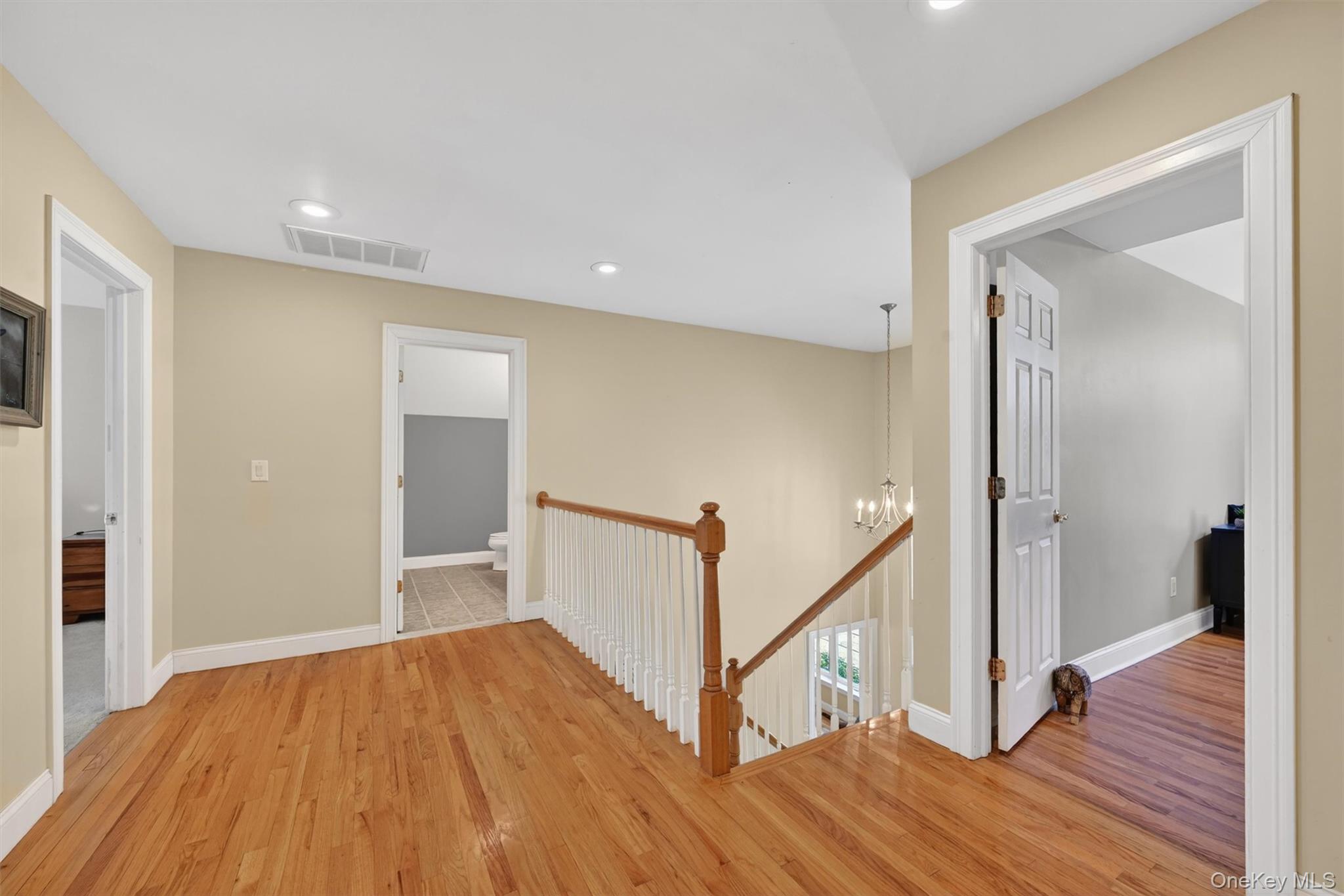 47 Willets Way Newburgh, NY 12550 - Photo 27 of 50 a view of hallway with wooden floor