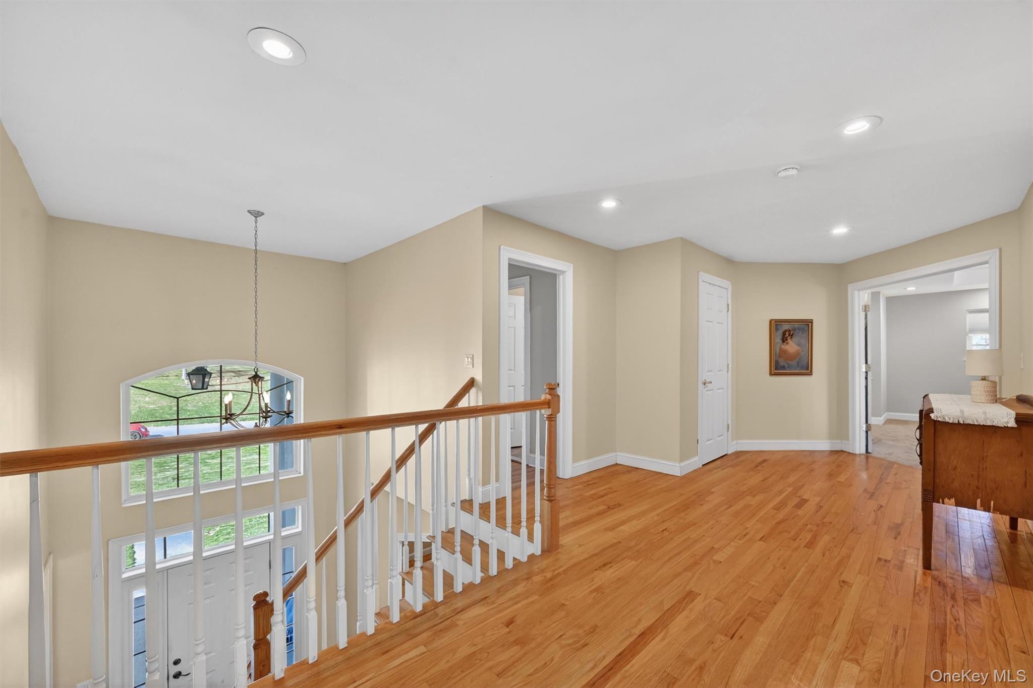 47 Willets Way Newburgh, NY 12550 - Photo 28 of 50 a view of an empty room with wooden floor