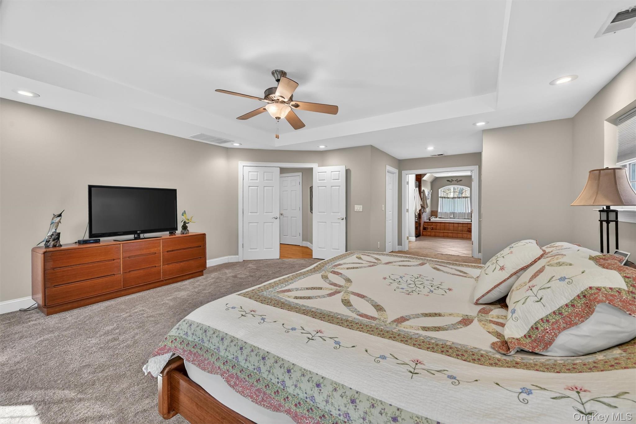 47 Willets Way Newburgh, NY 12550 - Photo 33 of 50 a bedroom with a bed and a flat screen tv