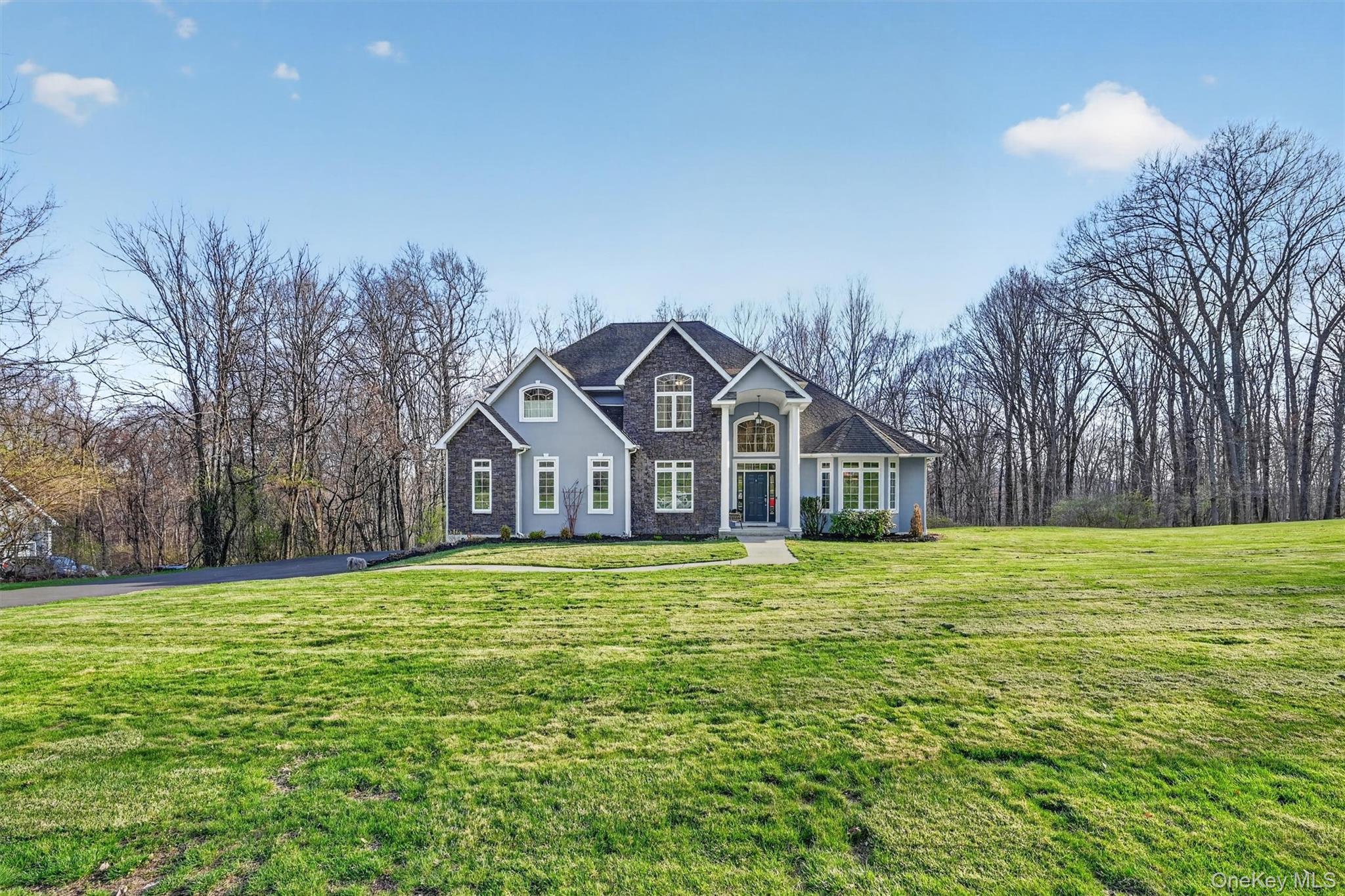 47 Willets Way Newburgh, NY 12550 - Photo 4 of 50 a front view of a house with a yard