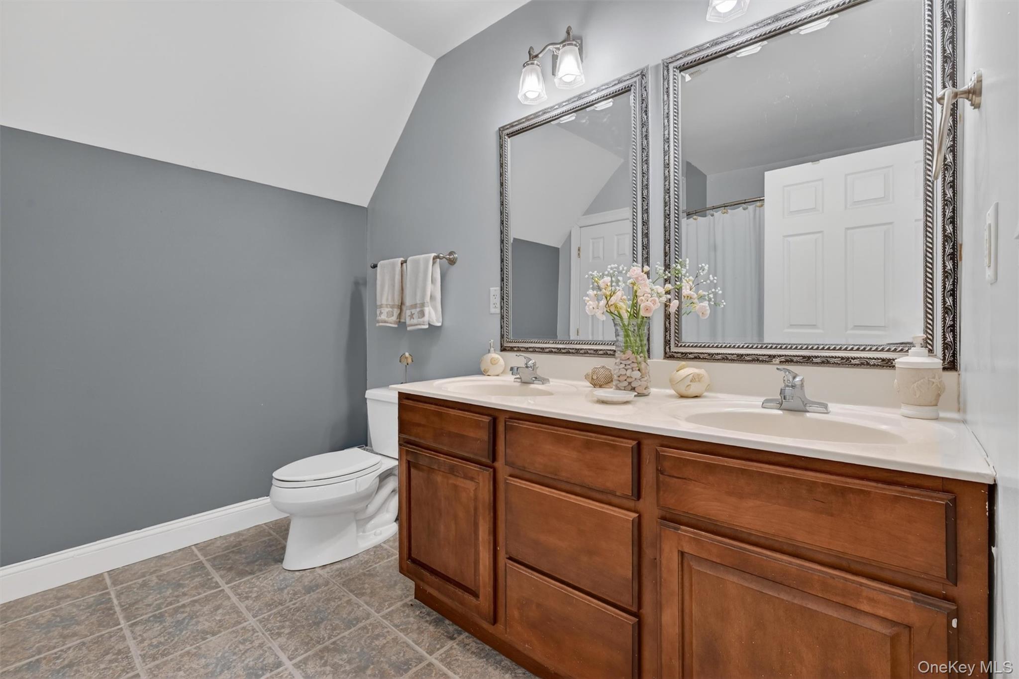 47 Willets Way Newburgh, NY 12550 - Photo 41 of 50 a bathroom with a double vanity sink toilet and mirror