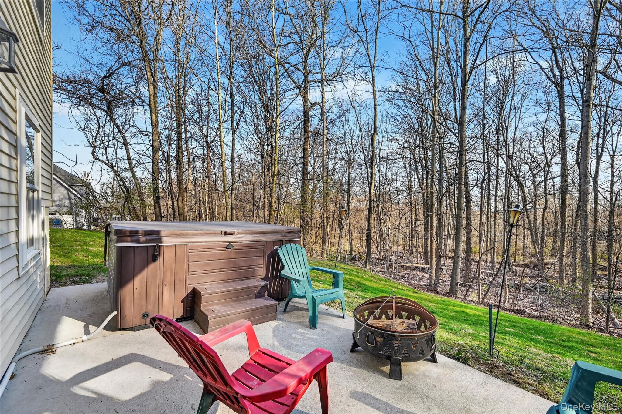 47 Willets Way Newburgh, NY 12550 - Photo 48 of 50 a view of a two chairs in the backyard