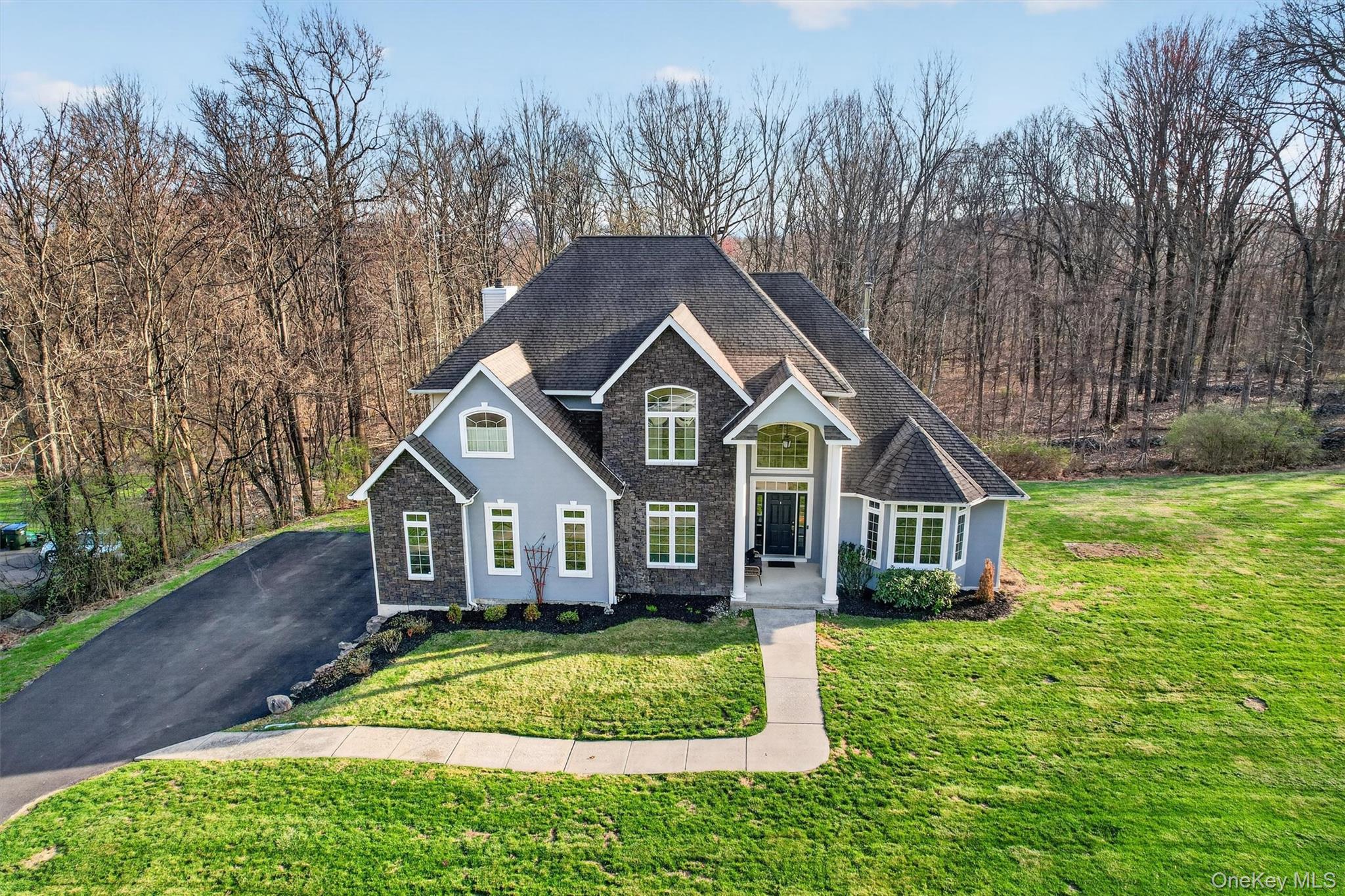 47 Willets Way Newburgh, NY 12550 - Photo 5 of 50 a front view of a house with garden