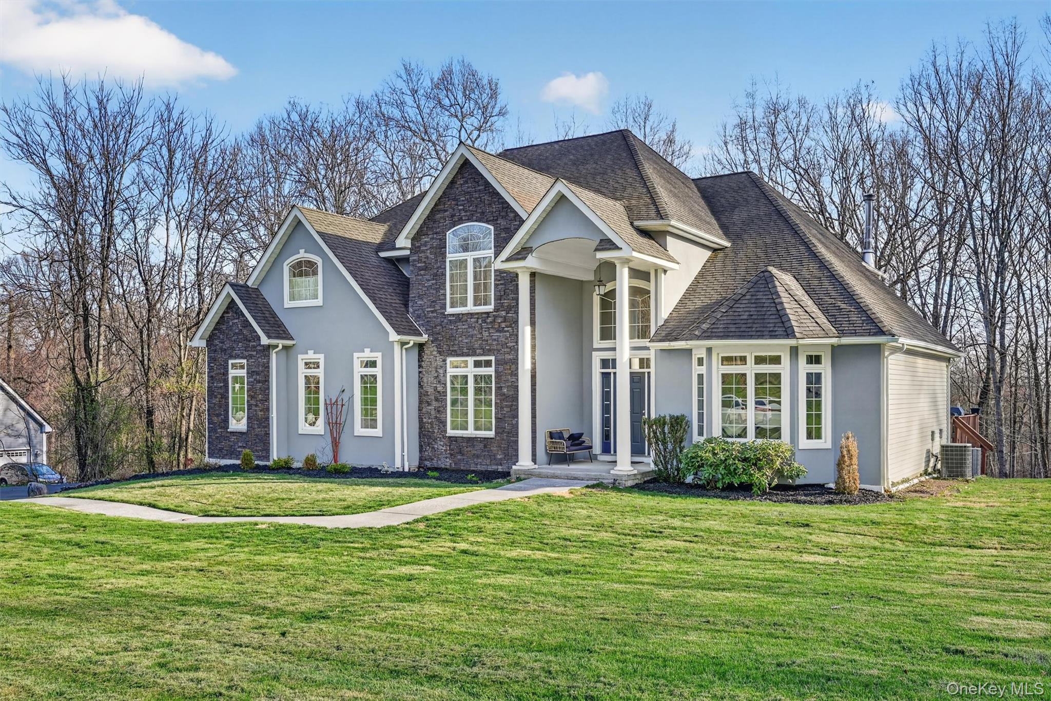 47 Willets Way Newburgh, NY 12550 - Photo 6 of 50 a front view of a house with a garden