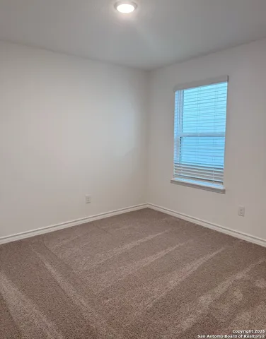 an empty room with a window