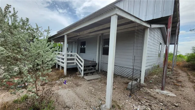 a house view with a outdoor space