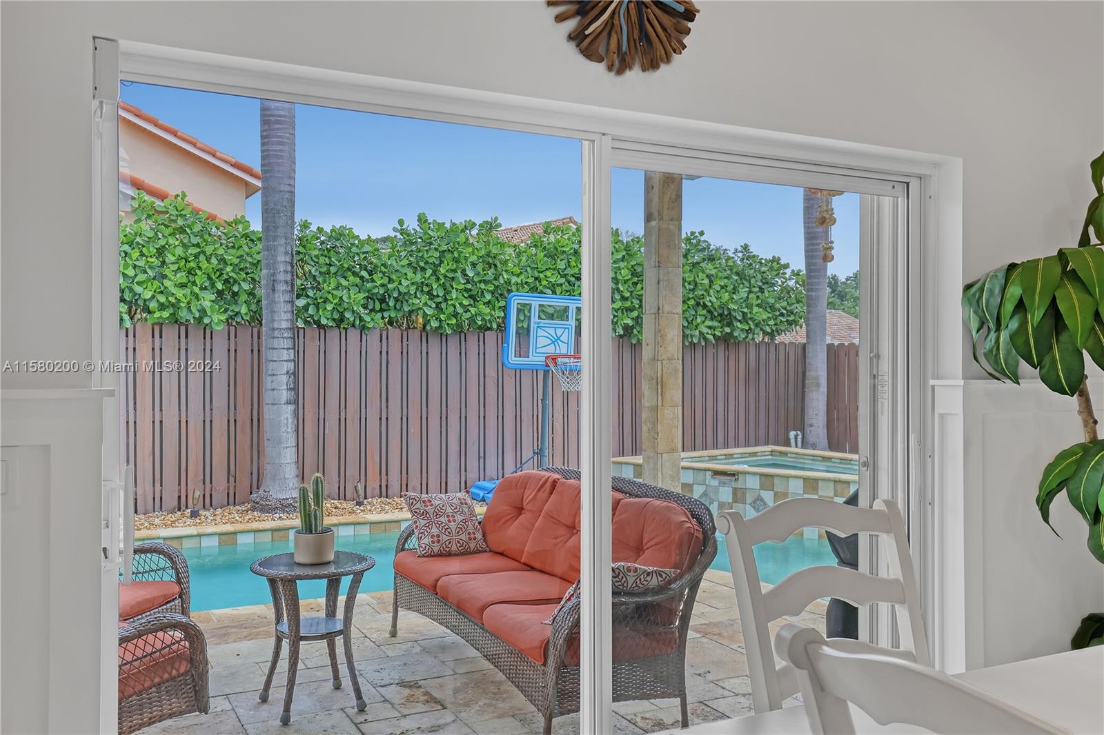 147 Stonebriar Boulevard Jupiter, FL 33458 - Photo 18 of 39 a outdoor living room with furniture